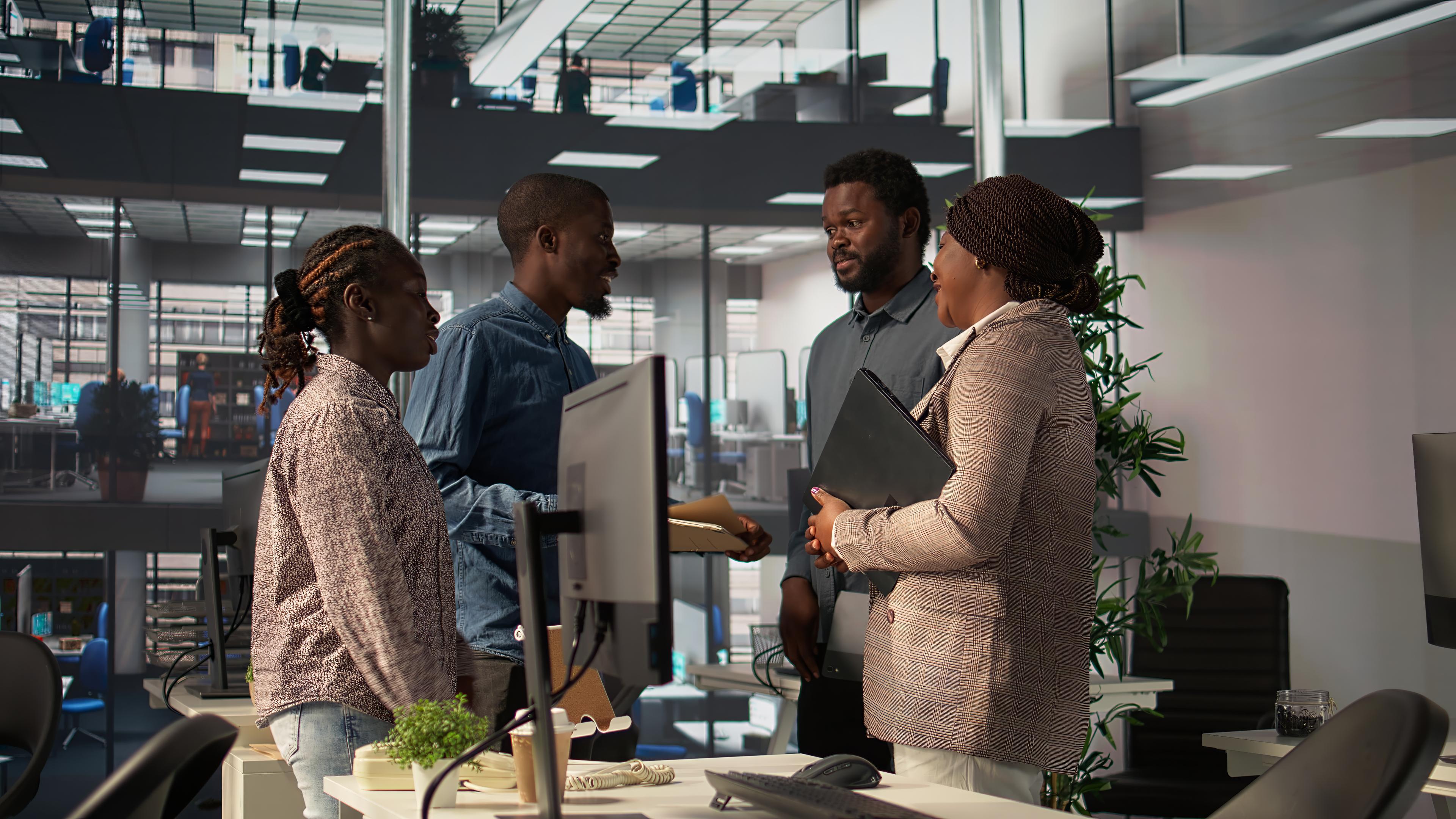 Professionals collaborating in a modern office